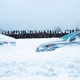 Two cars covered in deep snow